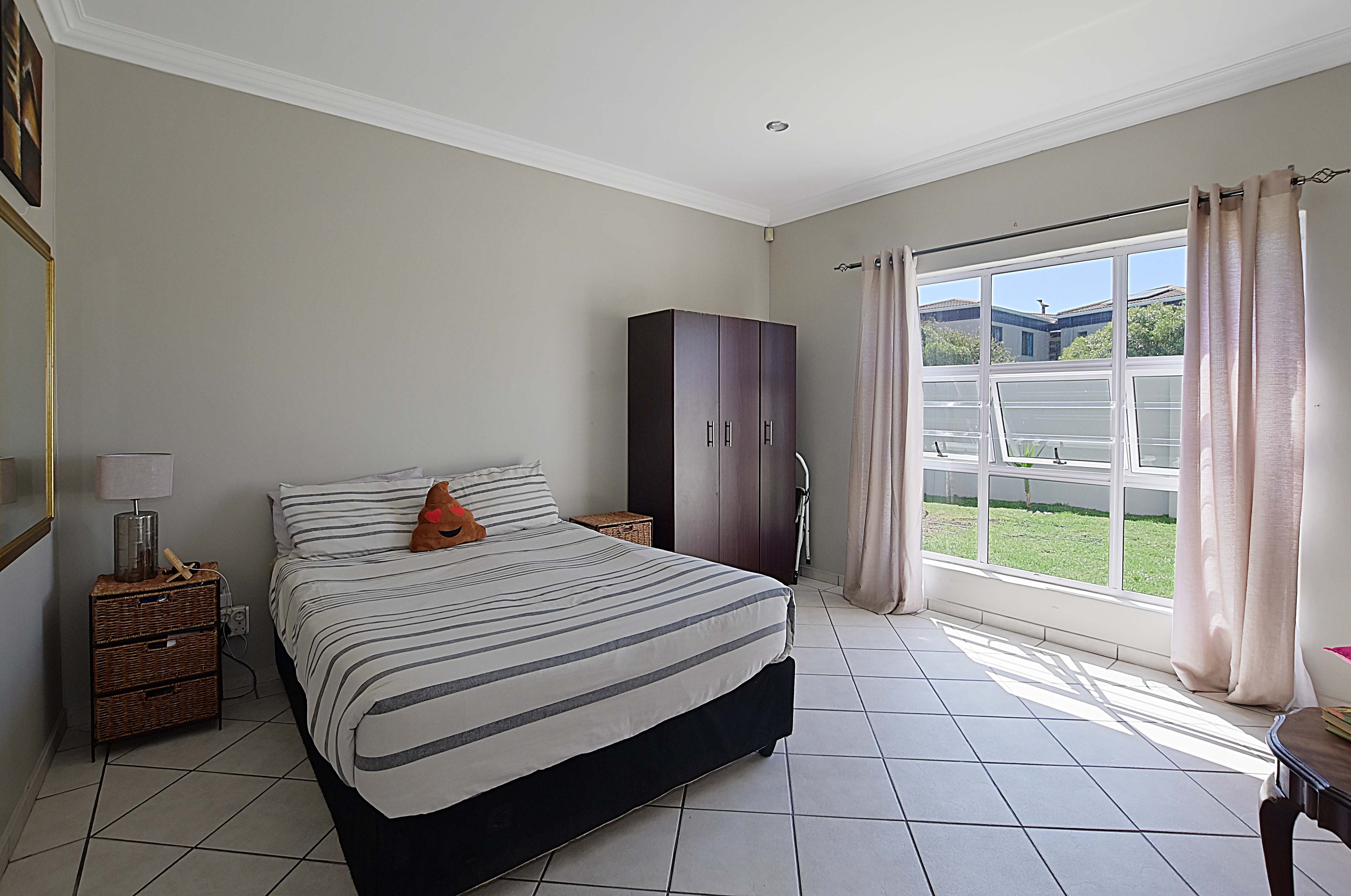 526m² Charming 4-Bedroom Family Home in Tranquil Parklands Pocket.
