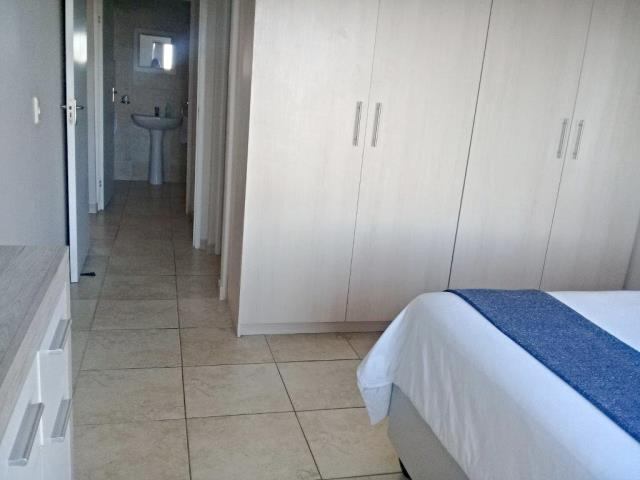 0m² Neat 2-Bedroom Apartment in Secure Complex.